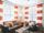 Furnished apartment living room decorated with orange decor